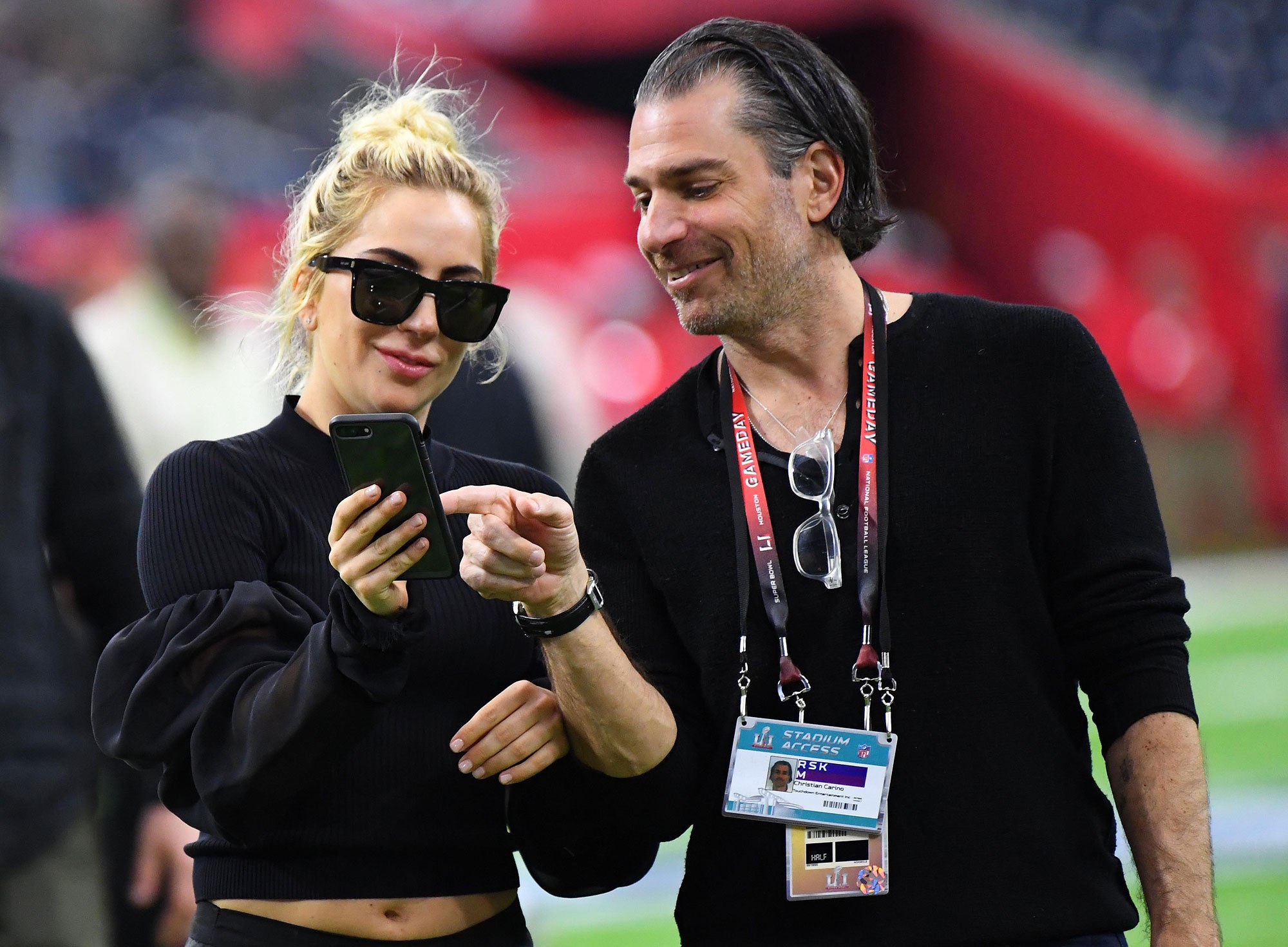 Feb 5, 2017; Houston, TX, USA; Recording artist Lady Gaga shows photos to Christian Carino before Super Bowl LI between the Atlanta Falcons and the New England Patriots at NRG Stadium. Mandatory Credit: Robert Deutsch-USA TODAY Sports *** Please Use Credit from Credit Field ***